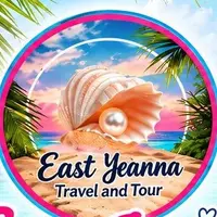 East Jeanna Travel and Tour logo: a pearl in a pink shell on a Palawan beach