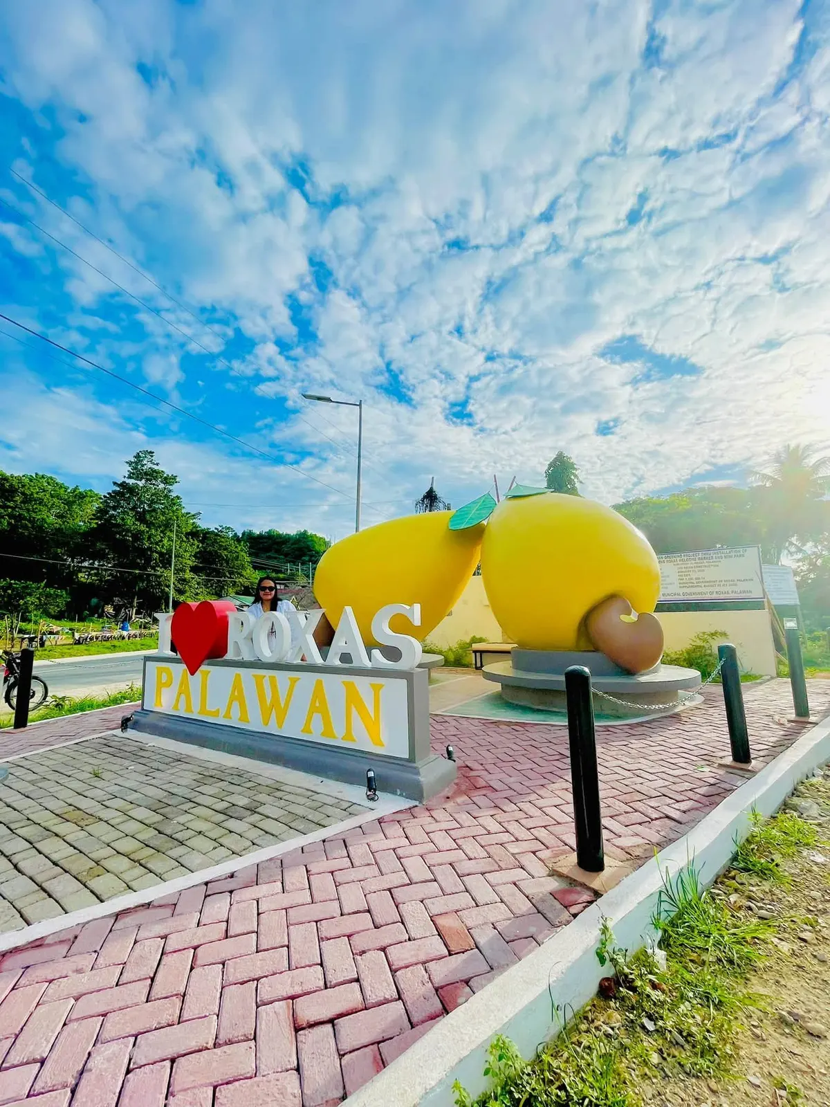 The I love Roxas Palawan sign under a big sky